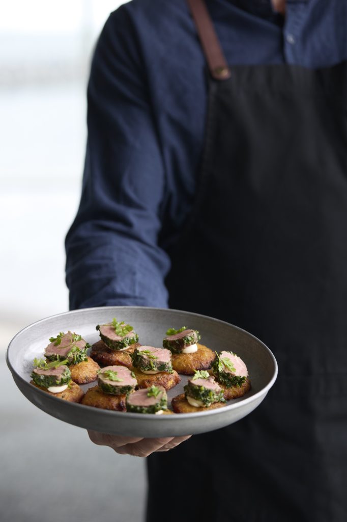 Service staff serving event canapes at a Melbourne event